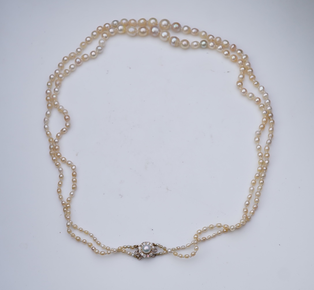 A natural pearl and diamond necklace, early 20th century